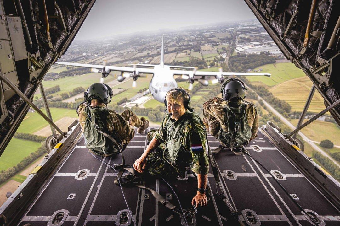 Dutch King Willem-Alexander of Netherlands sits on the back ramp of a military transport aircraft as he attends an international airborne exercise at Eindhoven Air Base in Eindhoven in the Netherlands on Sept. 18, 2025. During this exercise, the Airmobile Brigade and the Air Mobility Command will practice dropping cargo and paratroopers over the Netherlands. (Patrick Van Katwijk/ANP/AFP via Getty Images)