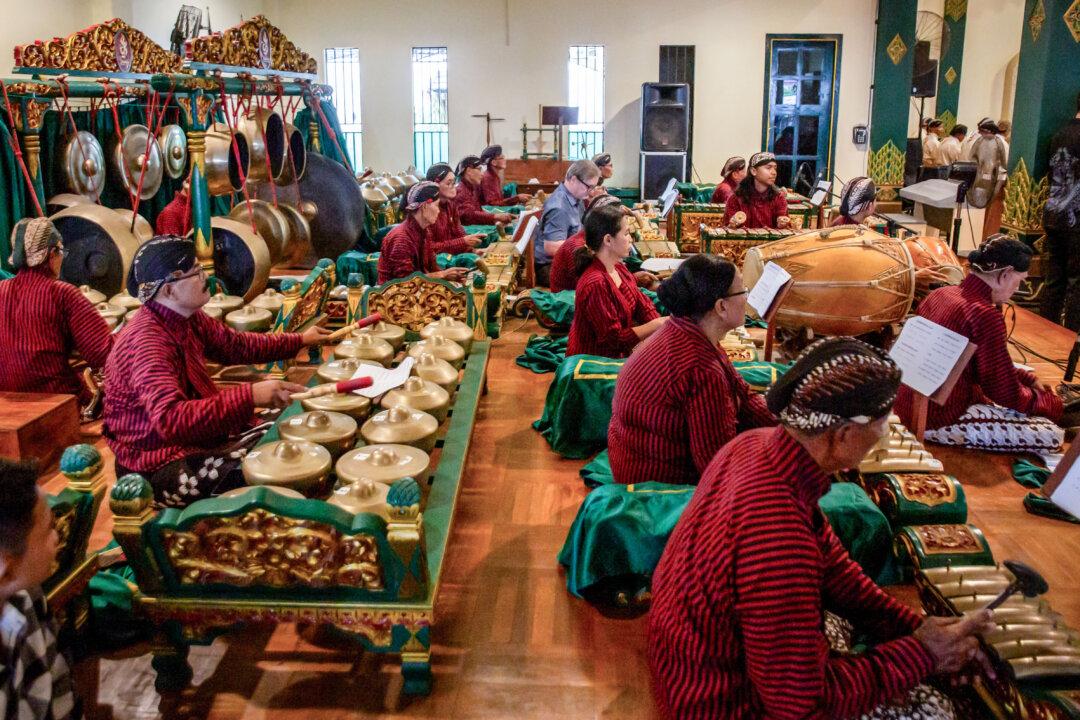 Catholic musicians play traditional Javanese gamelan instruments during a Christmas Eve Mass at the Sacred Heart of Jesus Church in Ganjuran, Yogyakarta, on Dec. 24, 2025. (Devi Rahman/AFP via Getty Images)