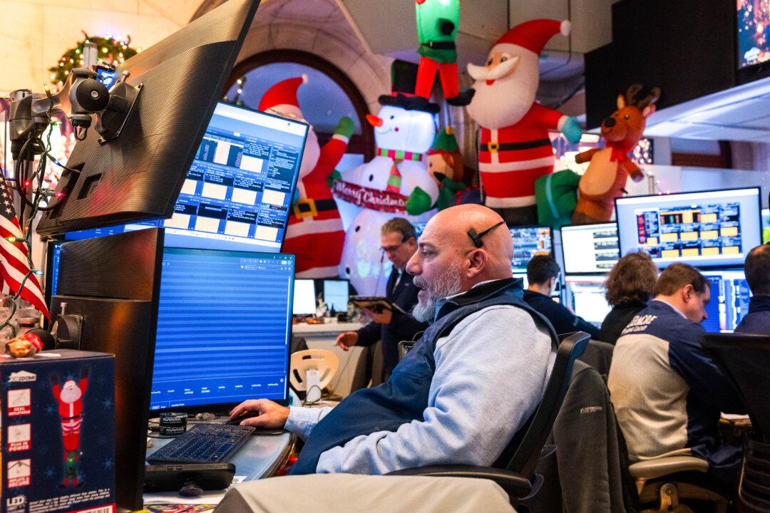Traders work on the floor of the New York Stock Exchange during a shortened trading day before the Christmas holiday in New York City on Dec. 24, 2025. The Dow Jones Industrial Average finished up nearly 300 points on positive economic data, indicating strength in the U.S. economy. (Spencer Platt/Getty Images)
