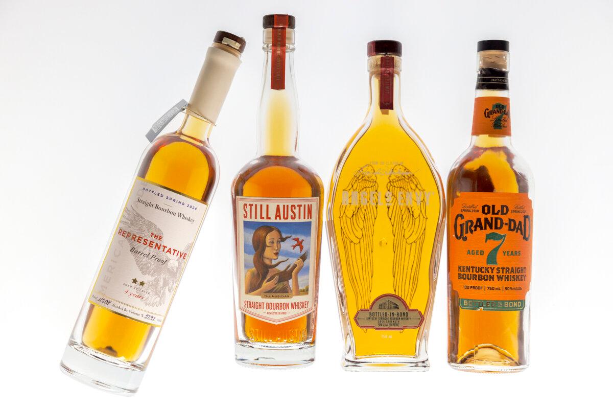 From left The Representative Straight Bourbon Whiskey, Still Austin Straight Bourbon Whiskey, Angels Envy Kentucky Straight Bourbon Whiskey and Old Grand Dad Kentucky Straight Bourbon Whiskey for Craig Laban, studio, Tuesday, Dec. 9, 2025. (Alejandro A Alvarez/The Philadelphia Inquirer/TNS)
