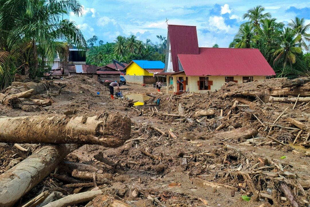 The Angkola Protestant Church amid flood devastation at Aek Ngadol village, South Tapanuli, North Sumatra province, Indonesia, on Dec. 25, 2025, in the aftermath of massive flooding and landslides in the area. (Amroe/AFP via Getty Images)