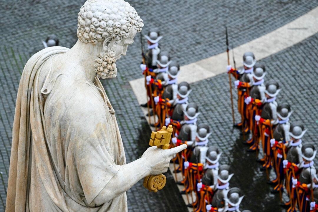 This photograph shows the statue of St. Peter before Pope Leo XIV addresses the Urbi et Orbi message and blessing to the city and the world as part of Christmas celebrations, at St. Peter's Square in the Vatican, on Dec. 25, 2025. (Andreas Solaro/AFP via Getty Images)