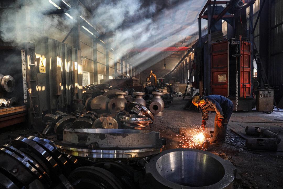 An employee works at a steel machinery factory in Hangzhou, Zhejiang Province, China, on June 6, 2025. (STR/AFP via Getty Images)