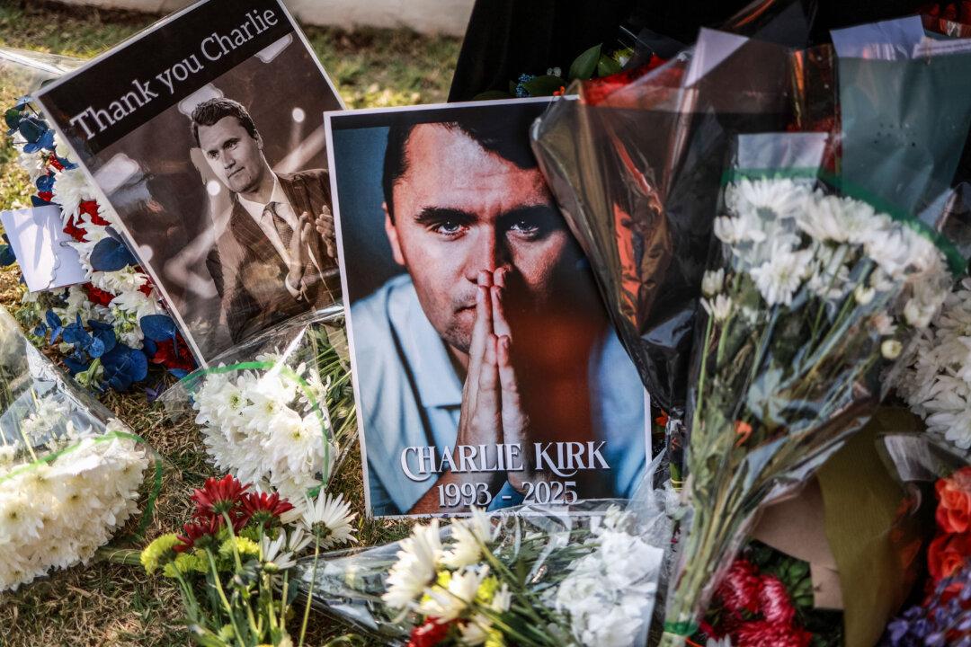 A makeshift memorial outside the U.S. Embassy in Pretoria, South Africa, on Sept. 11, 2025, following the Sept. 10 fatal shooting of conservative influencer Charlie Kirk at an event at Utah Valley University in Orem, Utah. (Phill Magakoe/AFP via Getty Images)