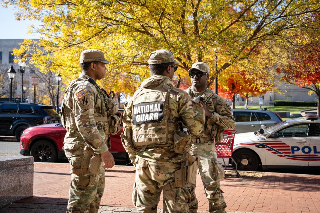 National Guard members at Judiciary Square metro stop in Washington on Nov. 24, 2025. (Madalina Kilroy/The Epoch Times)