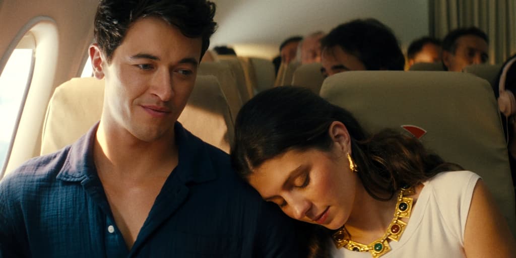 Alex (Tom Blyth) and Poppy (Emily Bader) take vacations together, in "People We Meet on Vacation." (Michele K. Short/2025 Copyright Netflix, Inc.)