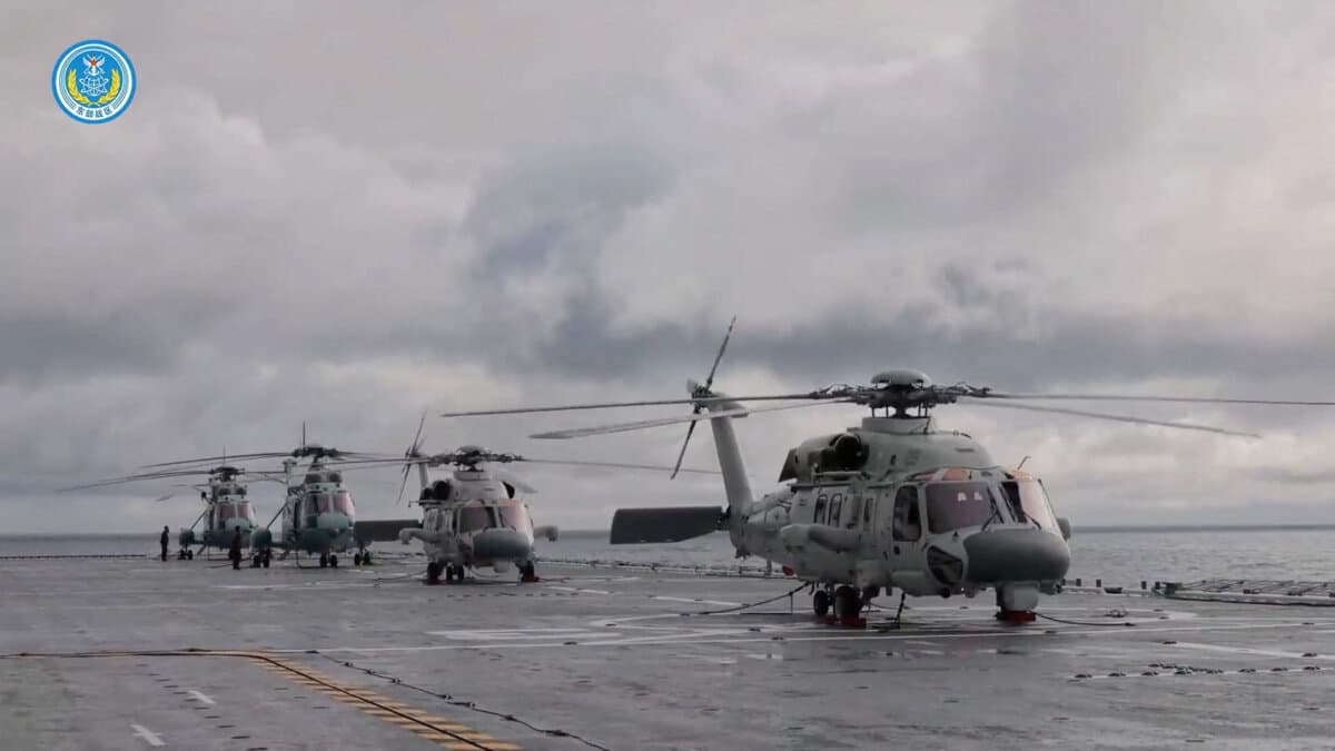 Helicopters on an amphibious assault ship take part in military drills in waters southeast of Taiwan, in this screenshot from a video released by the Eastern Theater Command of China's People's Liberation Army (PLA), on Dec. 29, 2025. (Eastern Theater Command/Handout via Reuters)