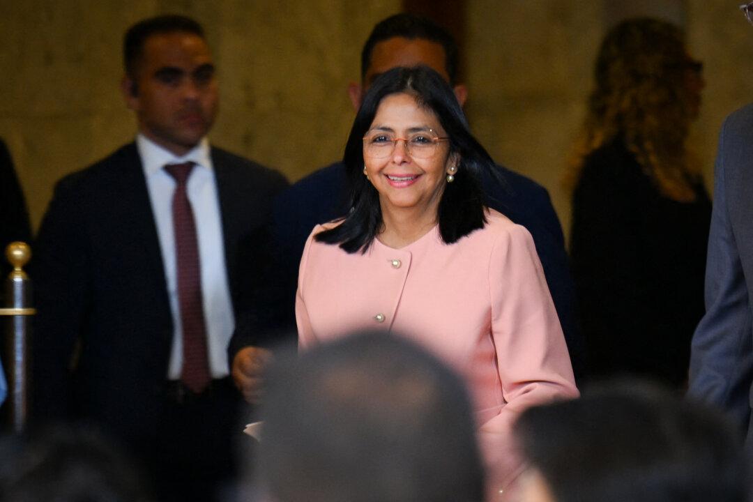 Venezuelan Vice President Delcy Rodriguez (C) and Venezuelan National Assembly President Jorge Rodriguez (R) arrive for a meeting with accredited diplomatic representatives in Caracas, Venezuela, on Sept. 29, 2025. (Juan Barreto/AFP via Getty Images)