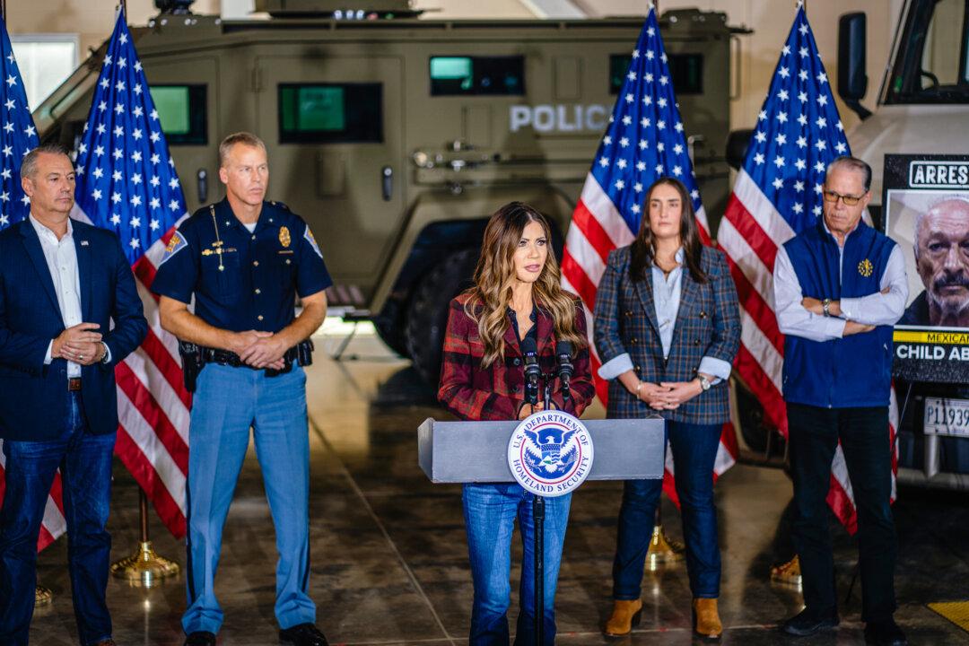 Homeland Security Secretary Kristi Noem (C) speaks during a news conference on immigration enforcement in Gary, Ind., on Oct. 30, 2025. Multiple drivers involved in fatal crashes in 2025, as listed in a Homeland Security report, had received their commercial driver's licenses in California and had entered the country illegally. (Jamie Kelter Davis/Getty Images)