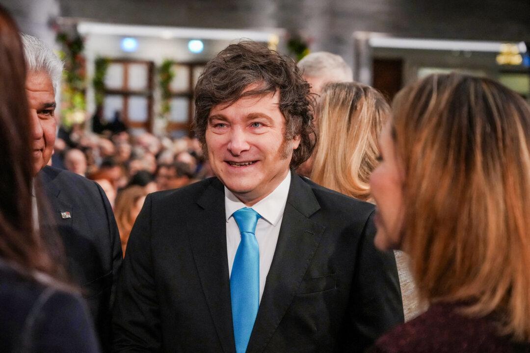 (Left) Honduras presidential candidate of the National Party Nasry Asfura speaks during a press conference in Tegucigalpa, Honduras, on Dec. 1, 2025. (Right) Argentine President Javier Milei (C) arrives at the Nobel Peace Prize ceremony at Oslo City Hall in Oslo, Norway, on Dec. 10, 2025. President Donald Trump has aggressively supported ideologically aligned leaders and candidates across Central and South America, backing Asfura’s presidential campaign and Milei’s party in midterm elections. (Marvin Recinos/AFP via Getty Images, Ole Berg-Rusten/NTB/AFP via Getty Images)