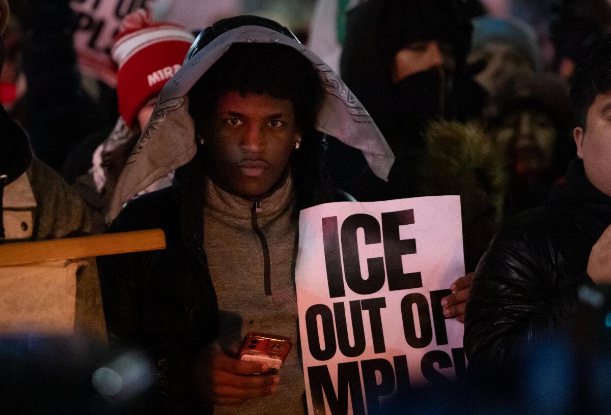 Protesters gather to demonstrate against Immigration and Customs Enforcement operations in Minneapolis on Jan. 8, 2026. (John Fredricks/The Epoch Times)