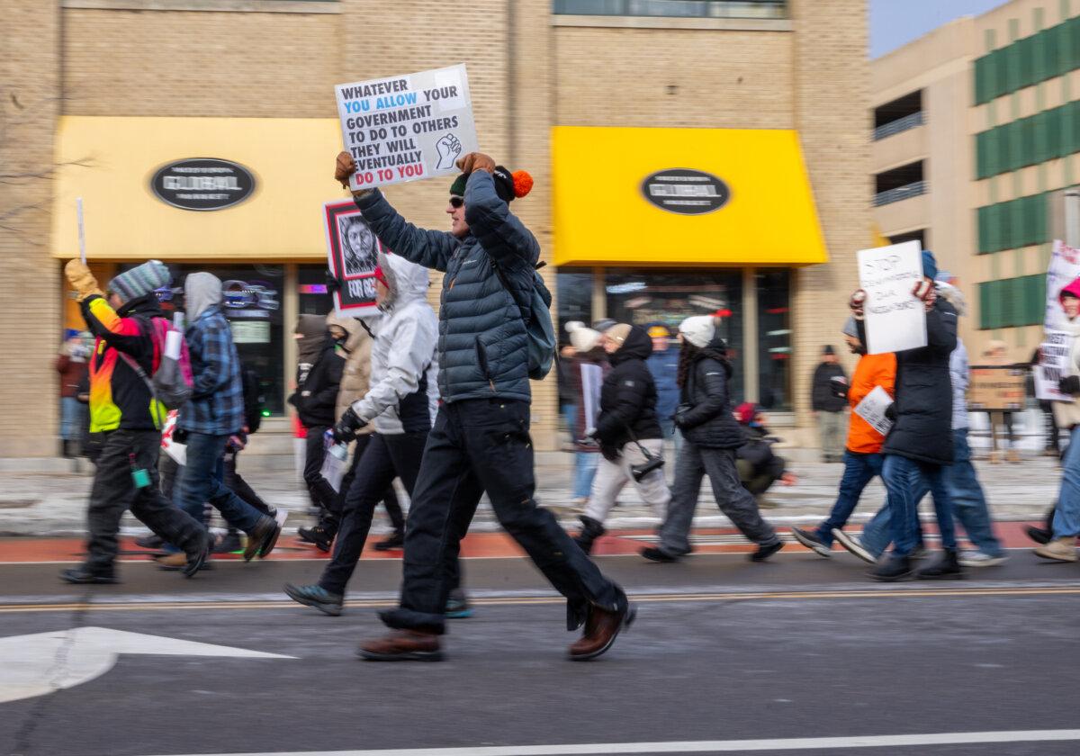 Protesters numbering in the thousands demonstrate against Immigration and Customs Enforcement operations in Minneapolis, on Jan. 10, 2026. (John Fredricks/The Epoch Times)