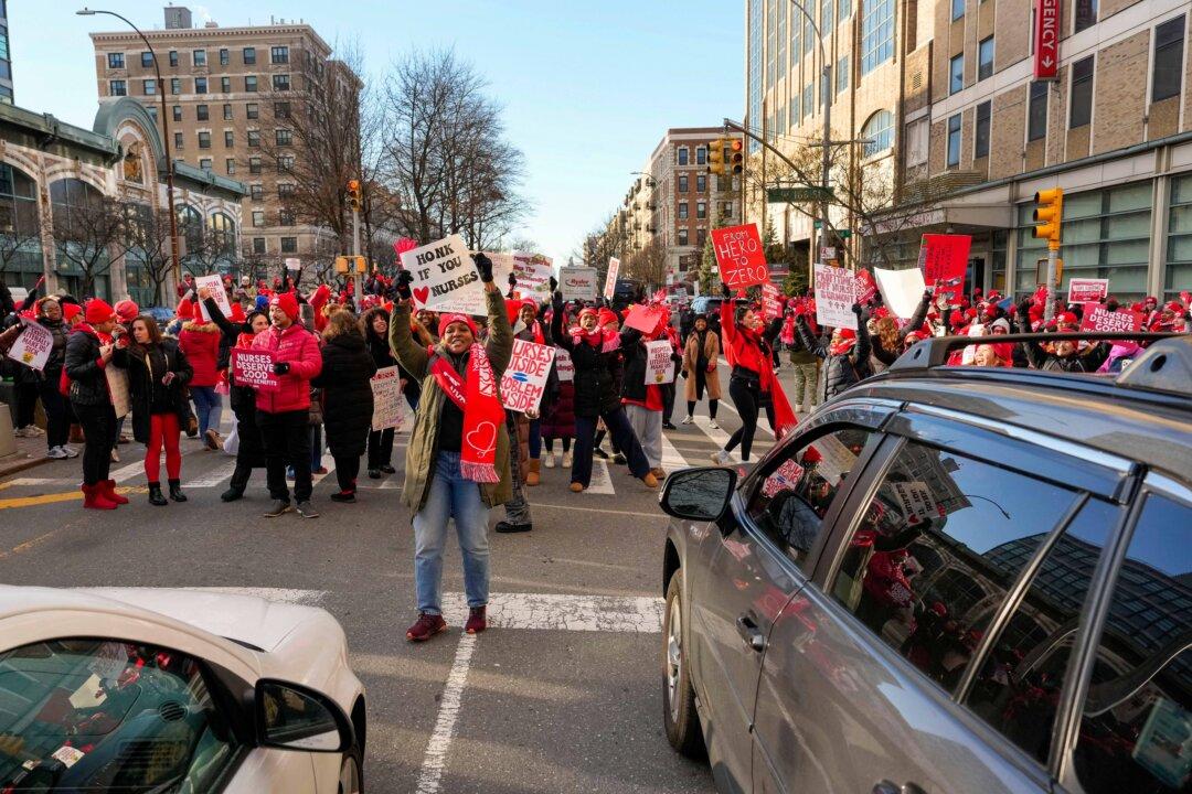 Nurses strike outside New York-Presbyterian Hospital in New York City on Jan. 12, 2026. Thousands of nurses in three hospital systems in New York went on strike after negotiations through the weekend failed to yield breakthroughs in their contract disputes. (Yuki Iwamura/AP Photo)