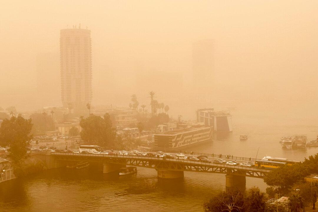 Motorists drive across a foggy bridge in the Egyptian capital of Cairo on Jan. 12, 2026. (Mohammed Abed/AFP via Getty Images)
