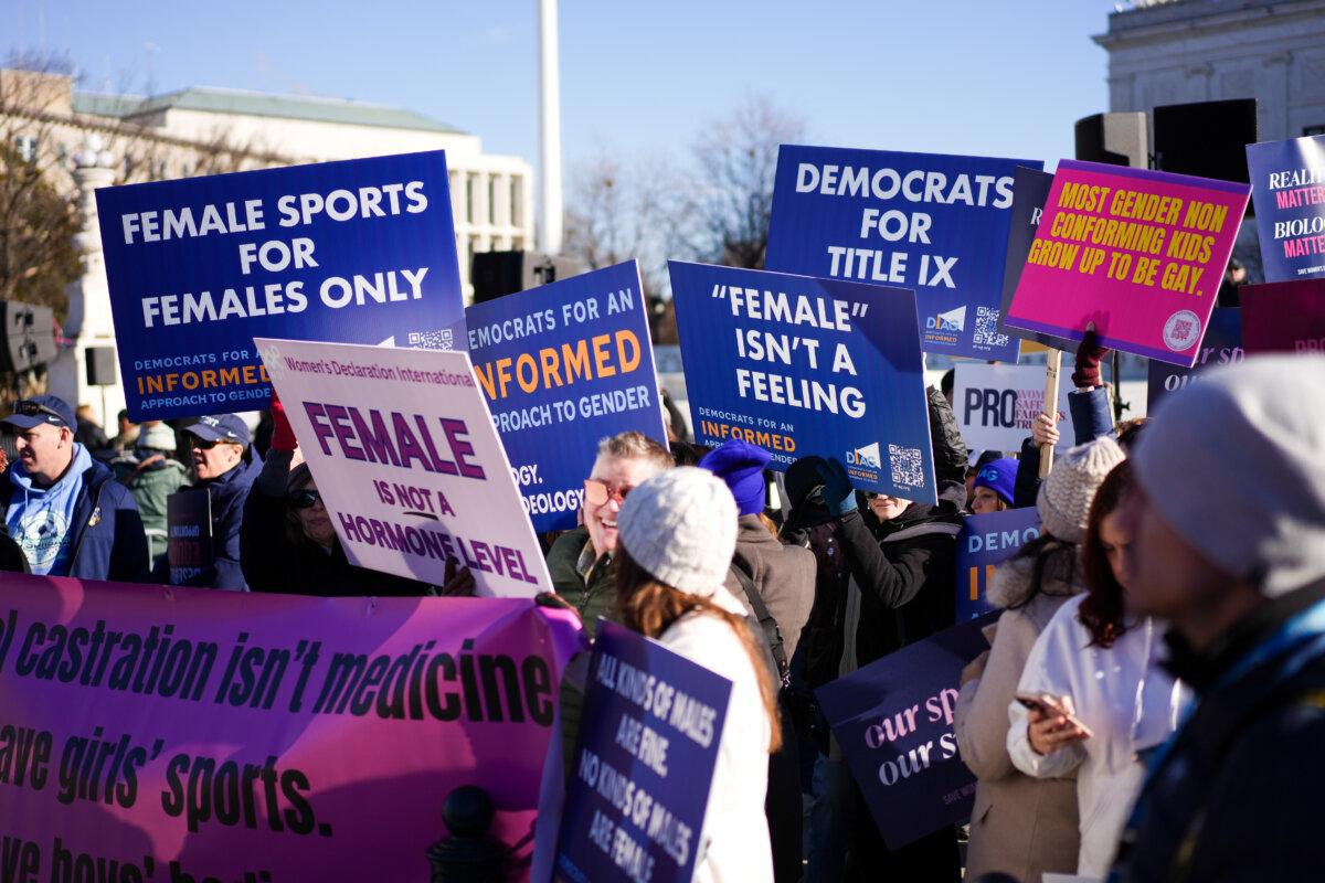 People take part in a rally, in support of Idaho and West Virginia laws protecting women's and girls' sports, at the U.S. Supreme Court in Washington on Jan. 13, 2025. (Madalina Kilroy/The Epoch Times)