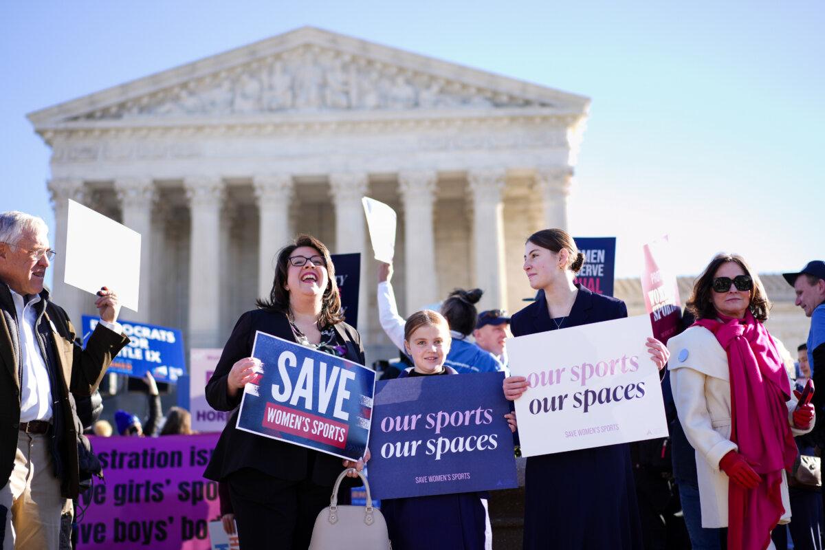 People take part in a rally, in support of Idaho and West Virginia laws protecting women's and girls' sports, at the U.S. Supreme Court in Washington on Jan. 13, 2025. (Madalina Kilroy/The Epoch Times)