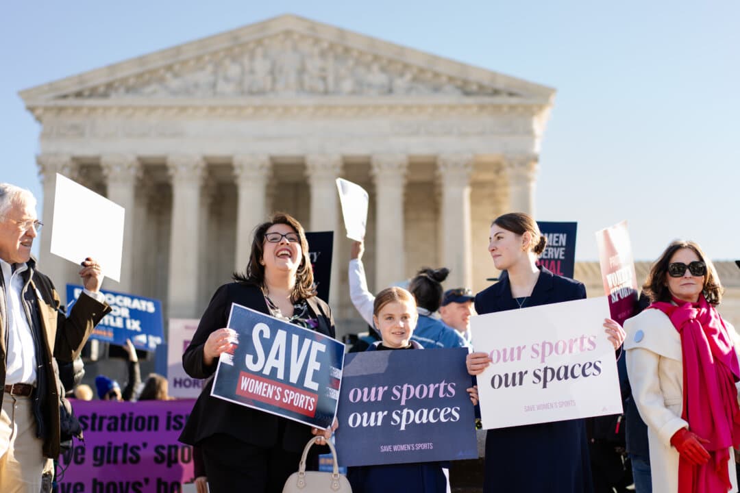 People take part in a rally outside the U.S. Supreme Court as justices hear arguments in two cases in which states banned males from participating in female-only sports, in Washington on Jan. 13, 2025. Moderate Democrat Marie Hurabiell opposes policies that allow males who identify as female to compete in girls’ and women’s sports. (Madalina Kilroy/The Epoch Times)