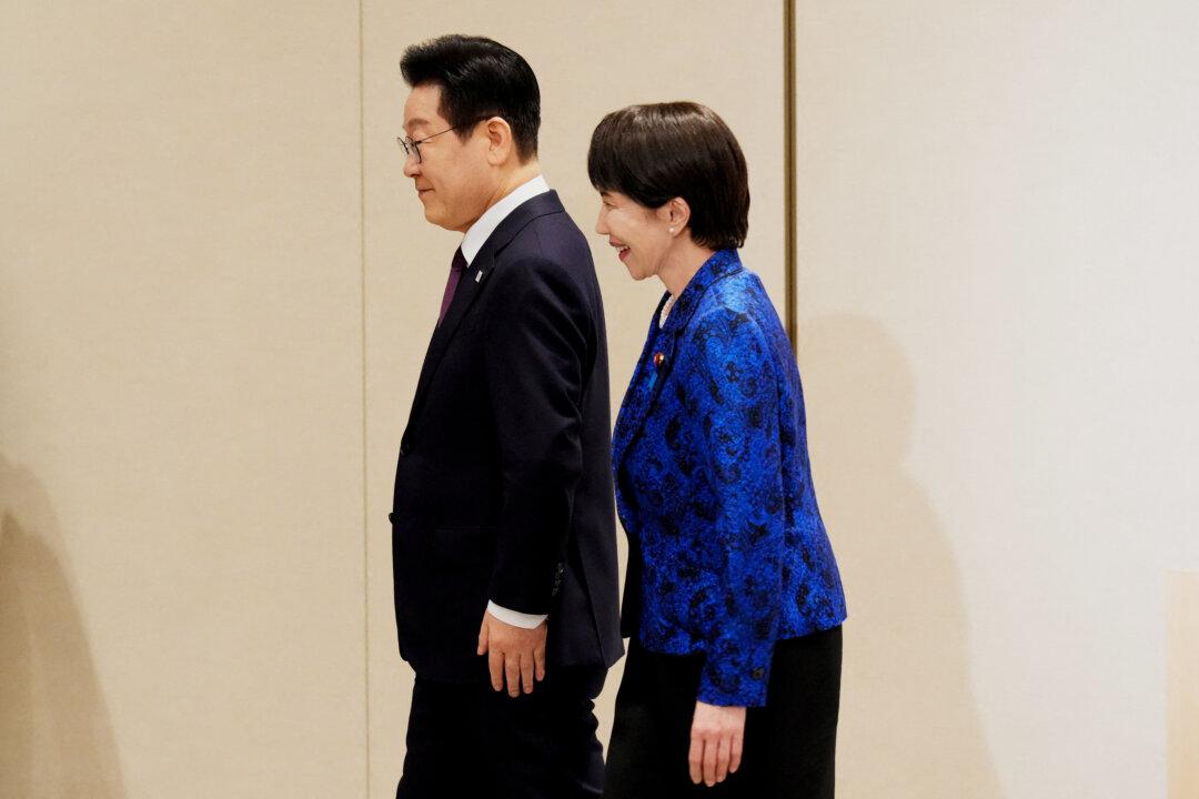 Japanese Prime Minister Sanae Takaichi and South Korean President Lee Jae Myung leave their joint news conference following their talk in Nara, Japan, on Jan. 13, 2026. (Eugene Hoshiko/POOL/AFP via Getty Images)