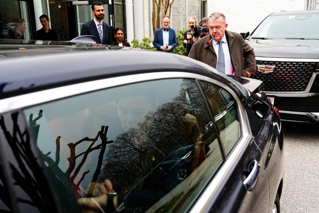 Greenland's Foreign Minister Vivian Motzfeldt (L, in car) and Denmark's Foreign Minister Lars Lokke Rasmussen leave Denmark's embassy in Washington on Jan. 14, 2026, ahead of a meeting with the U.S. vice president and the U.S. secretary of state later in the day. (Mads Claus Rasmussen/Ritzau Scanpix/AFP via Getty Images)