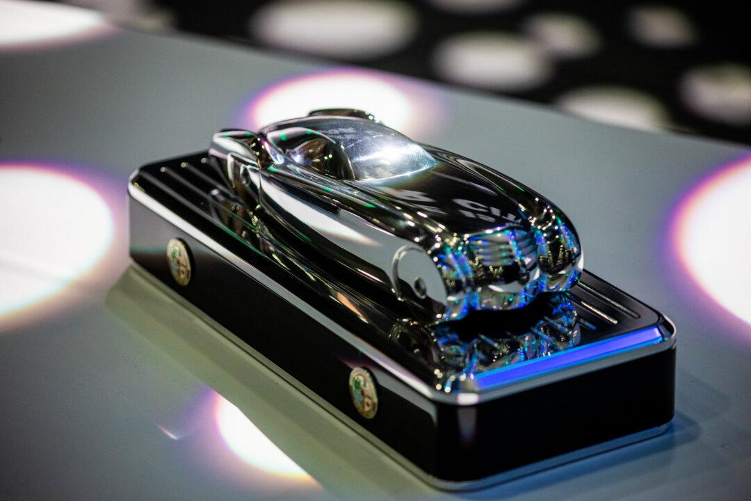 One of the three awards for the North American Car, Truck, and Utility Vehicle of the Year Awards sits on a table on stage before the winners were announced at the 2026 Detroit Auto Show in Detroit, Mich., on Jan. 14, 2026. (Bill Pugliano/Getty Images)