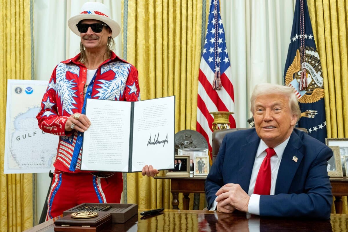 Singer Kid Rock holds an executive order signed by President Donald Trump in the Oval Office on March 31, 2025. (Saul Loeb/AFP via Getty Images)