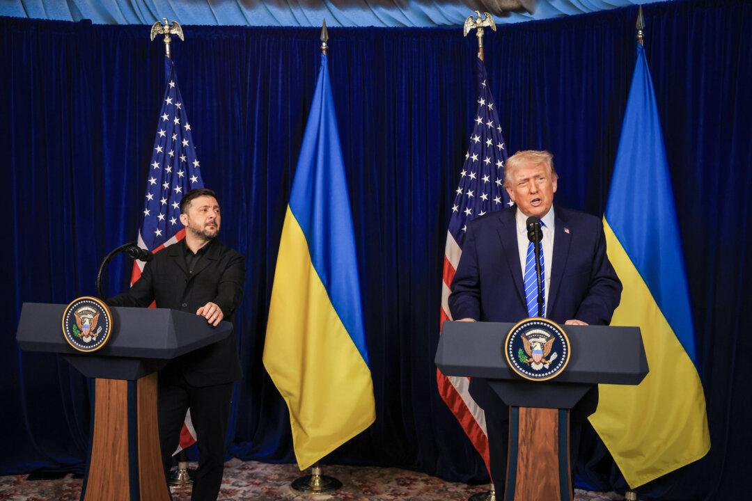 U.S. President Donald Trump speaks alongside Ukrainian President Volodymyr Zelenskyy during a news conference following their meeting at Mar-a-Lago in Palm Beach, Fla., on Dec. 28, 2025. Trump invited Zelenskyy to work on the U.S.-proposed peace plan to end the Russia–Ukraine war. (Joe Raedle/Getty Images)