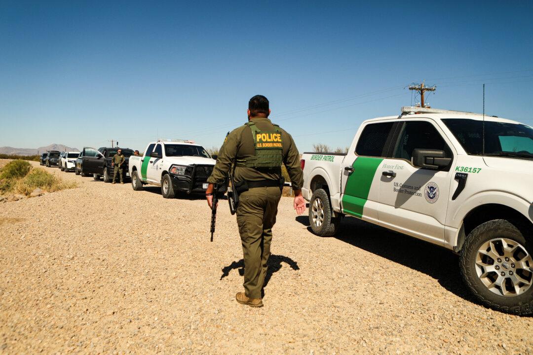 A U.S. Border Patrol agent from the Big Bend Sector takes part in a binational patrol called Operation Mirror with Mexican Army personnel to deter migrant crossings from Ojinaga, Mexico, to Presidio, Texas, on Nov. 4, 2025. (Herika Martinez/AFP via Getty Images)