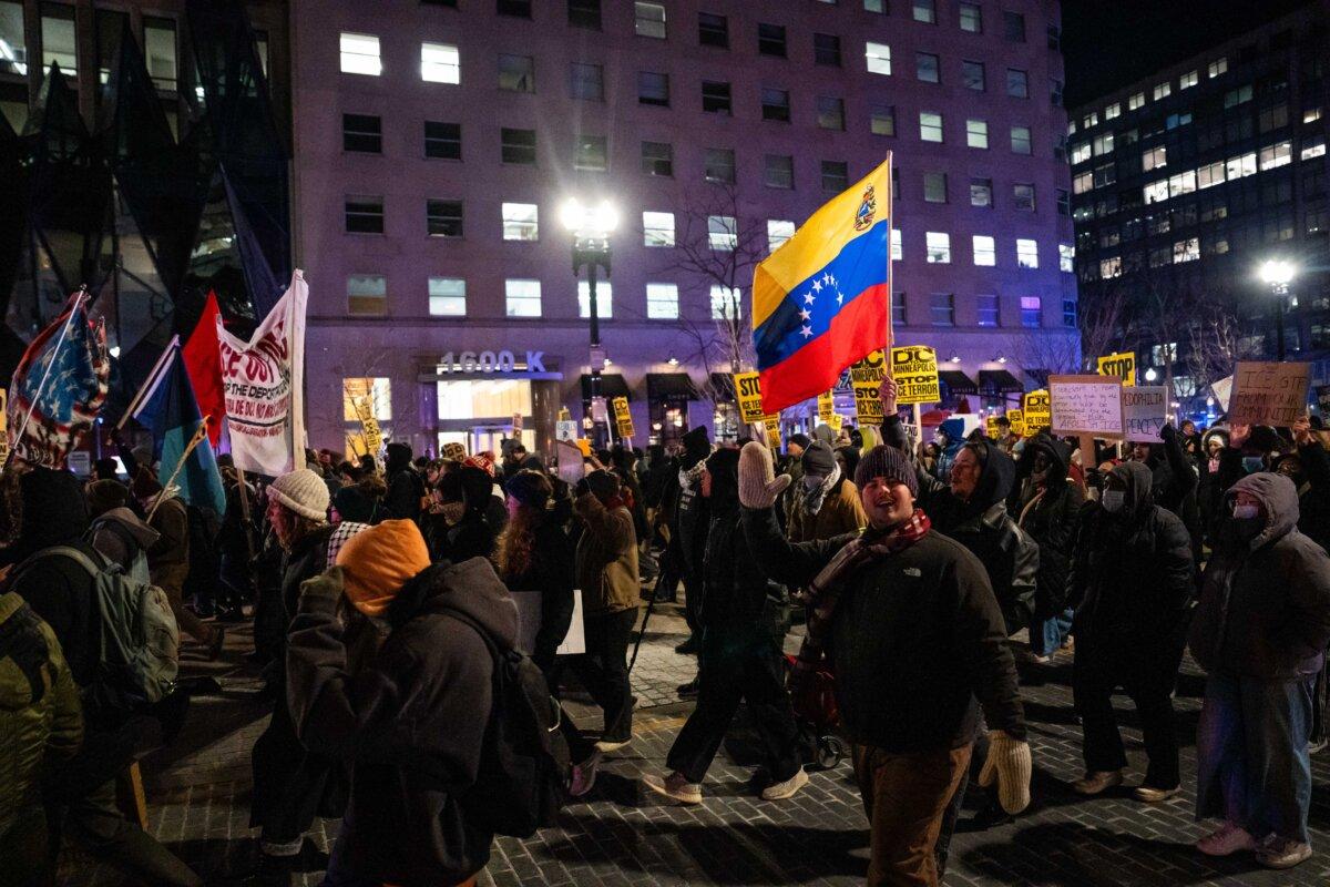 People join a march to protest against Immigration and Customs Enforcement operations, in Washington on Jan. 20, 2026. (Madalina Kilroy/The Epoch Times)