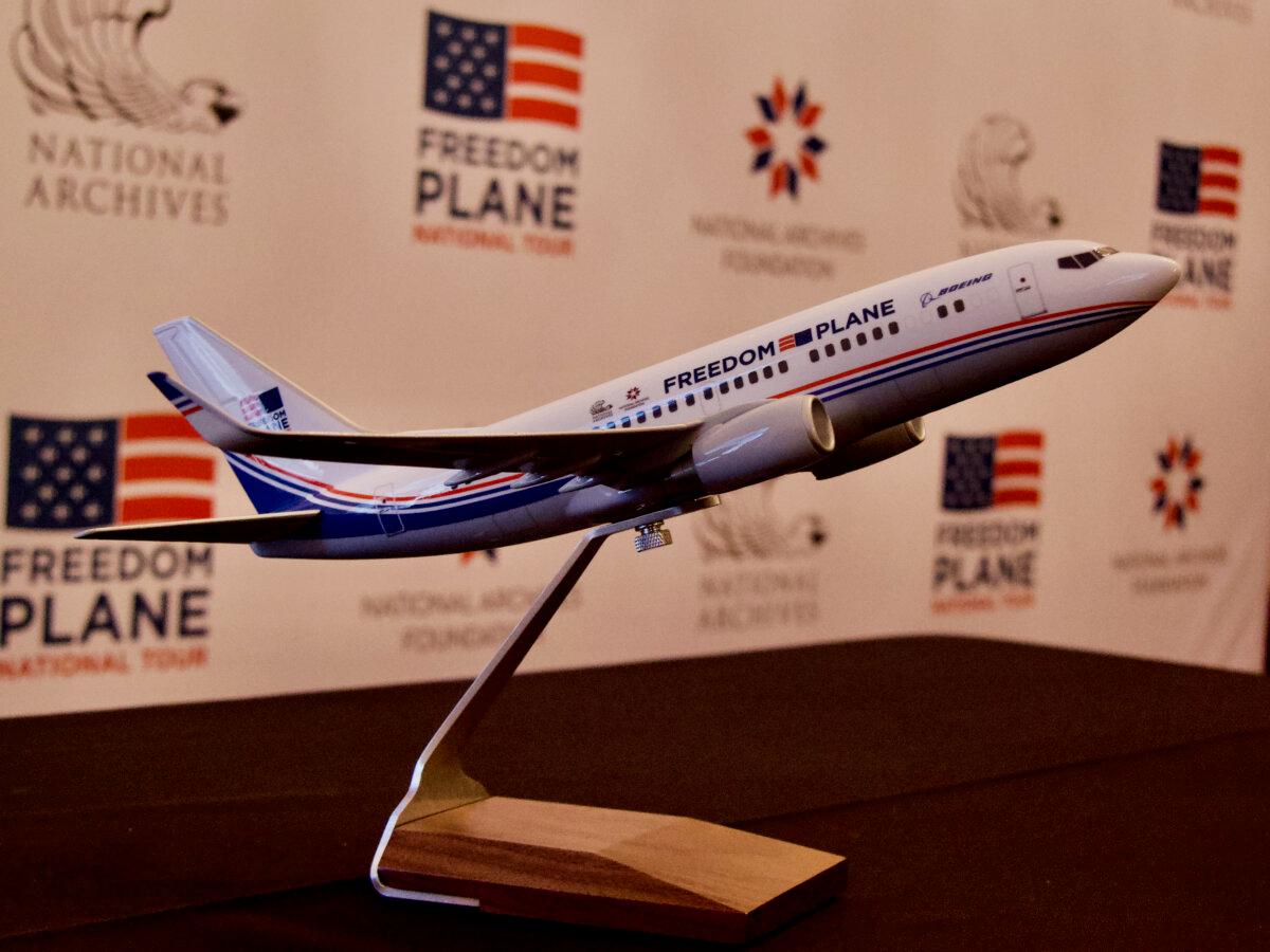 A model of the Freedom Plane, a specially designed Boeing aircraft that will carry original documents to eight cities around the nation to celebrate America's 250th anniversary, as seen at the National Archives on Jan. 20, 2026. (Travis Gillmore/The Epoch Times)