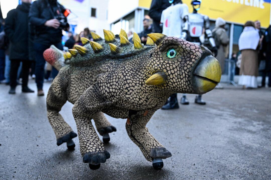 A Unitree Robotic model dressed as an Ankylosaurus dinosaur stands in the street of the Swiss Alpine resort of Davos on Jan. 21, 2026, during the World Economic Forum annual meeting. (Ina Fassbender/AFP via Getty Images)