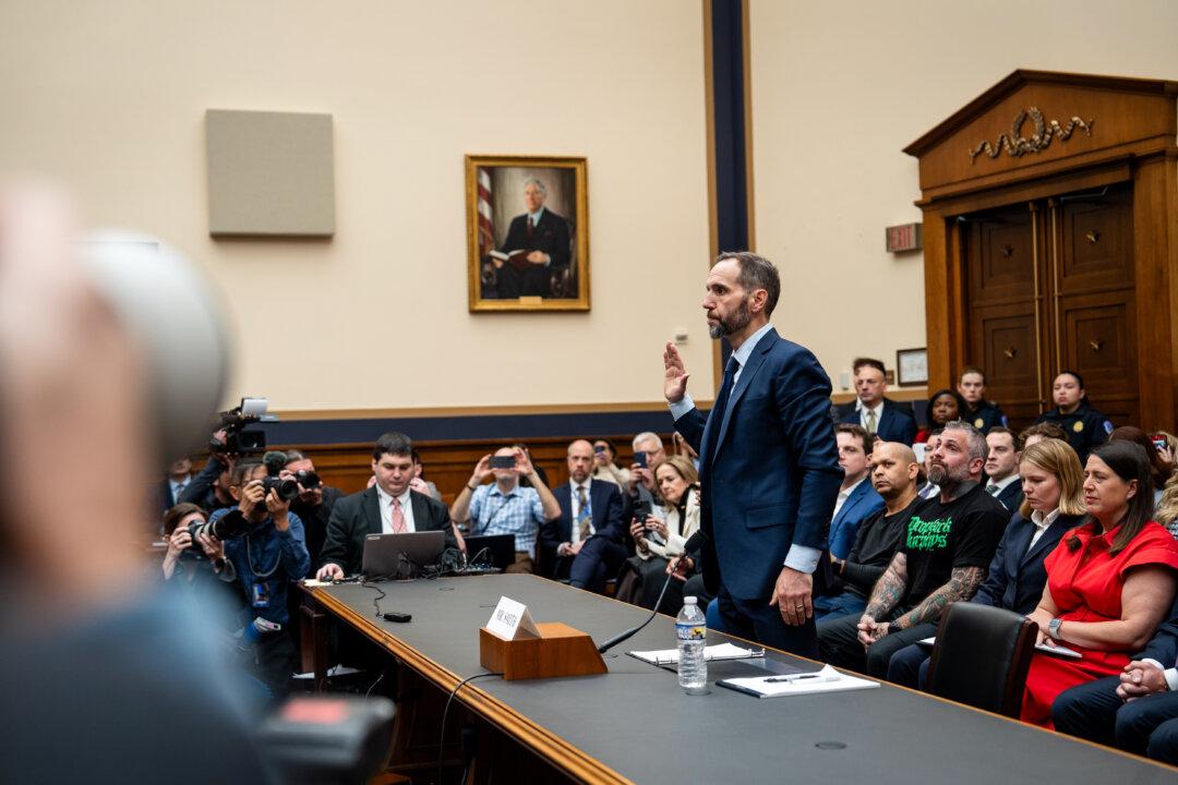 Former special counsel Jack Smith is sworn in ahead of testifying about his investigations into President Donald Trump, before the House Judiciary Committee on Capitol Hill in Washington, on Jan. 22, 2026. (Madalina Kilroy/The Epoch Times)
