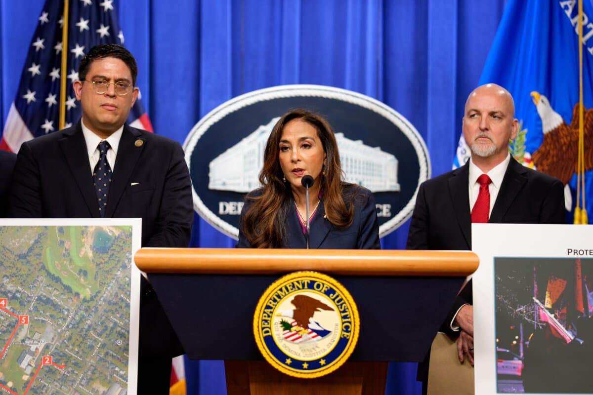 Assistant Attorney General for Civil Rights Harmeet Dhillon, accompanied by her aides, speaks at the Justice Department in Washington on Sept. 29, 2025. (Andrew Harnik/Getty Images)