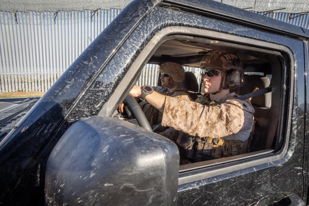 (Top Left) Razor wire installed by U.S. military personnel lines the U.S. border wall outside San Diego on Jan. 20, 2026. (Top Right, Bottom Left-Right) U.S. Marines patrol the U.S.–Mexico border near San Diego on Jan. 20, 2026. About 500 Marines from Camp Pendleton in California were deployed to the Yuma and San Diego sectors to reinforce border barriers. (John Fredricks/The Epoch Times)