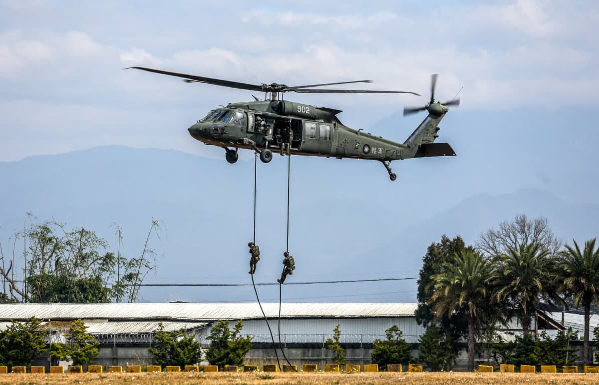 Taiwanese military personnel rappel down from a Black Hawk helicopter during a spring military exercise in Taichung. Taiwan, on Jan. 27, 2026. (Photo by I-Hwa Cheng/AFP via Getty Images)