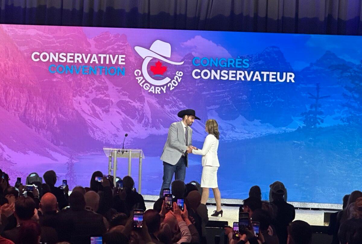Alberta Premier Danielle Smith is welcomed to the stage by former Conservative MP Damien Kurek at the federal Conservative Party's national convention in Calgary on Jan. 31, 2026. (Omid Ghoreishi/The Epoch Times)