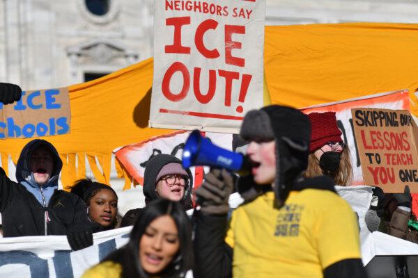 High school students at the Minnesota Capitol in St. Paul call for an end to federal immigration enforcement operations. (Octavio Jones / AFP via Getty Images)