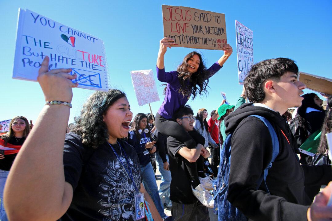 Students from North Forney High School participate in an anti-ICE walkout in Forney, Texas, on Feb. 5, 2026. (Bobby Sanchez for The Epoch Times)