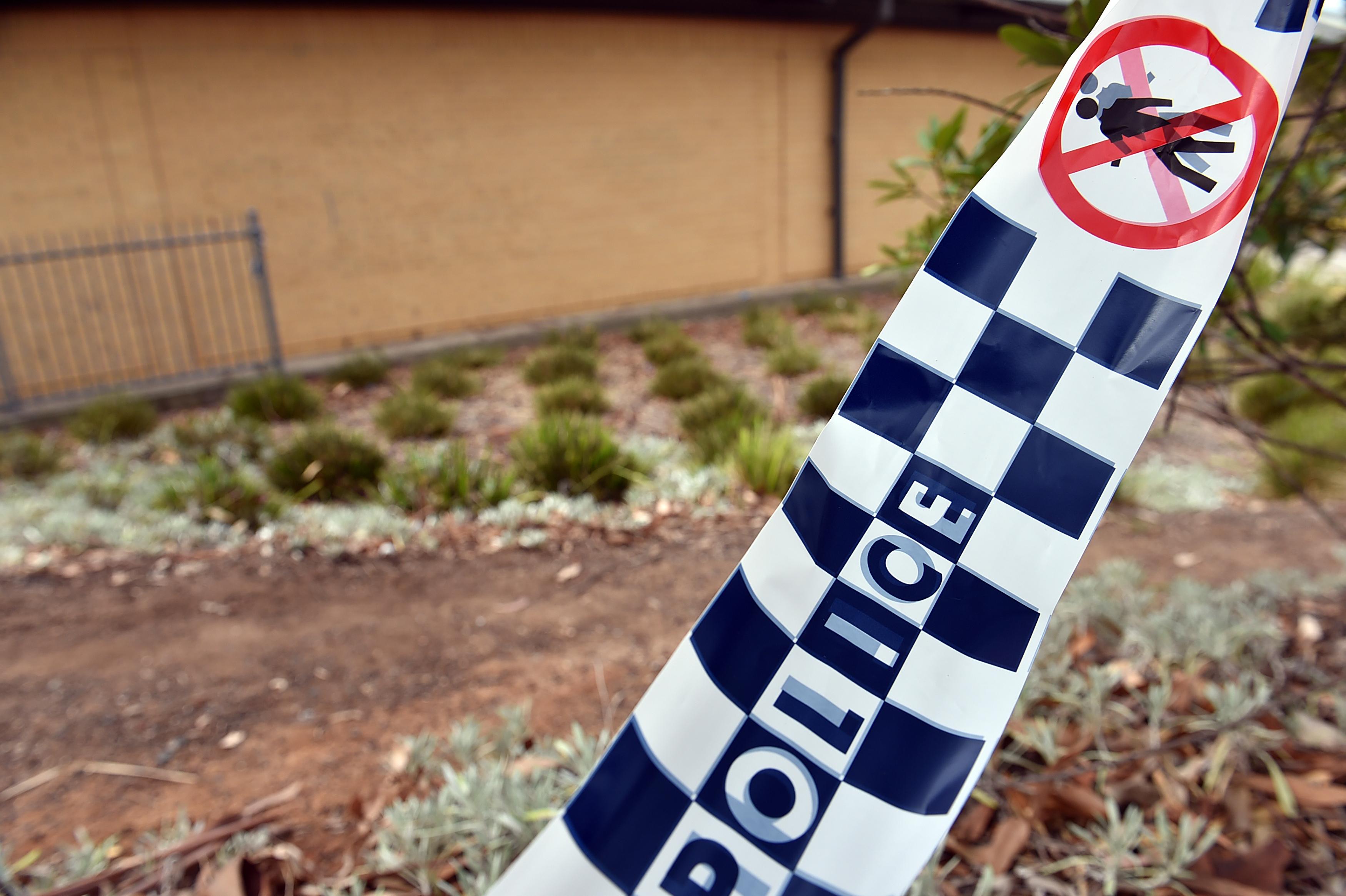 Police tape near the site of a stabbing incident in the west of Sydney, Australia, on Feb. 2, 2017. (Saeed Khan/AFP via Getty Images)