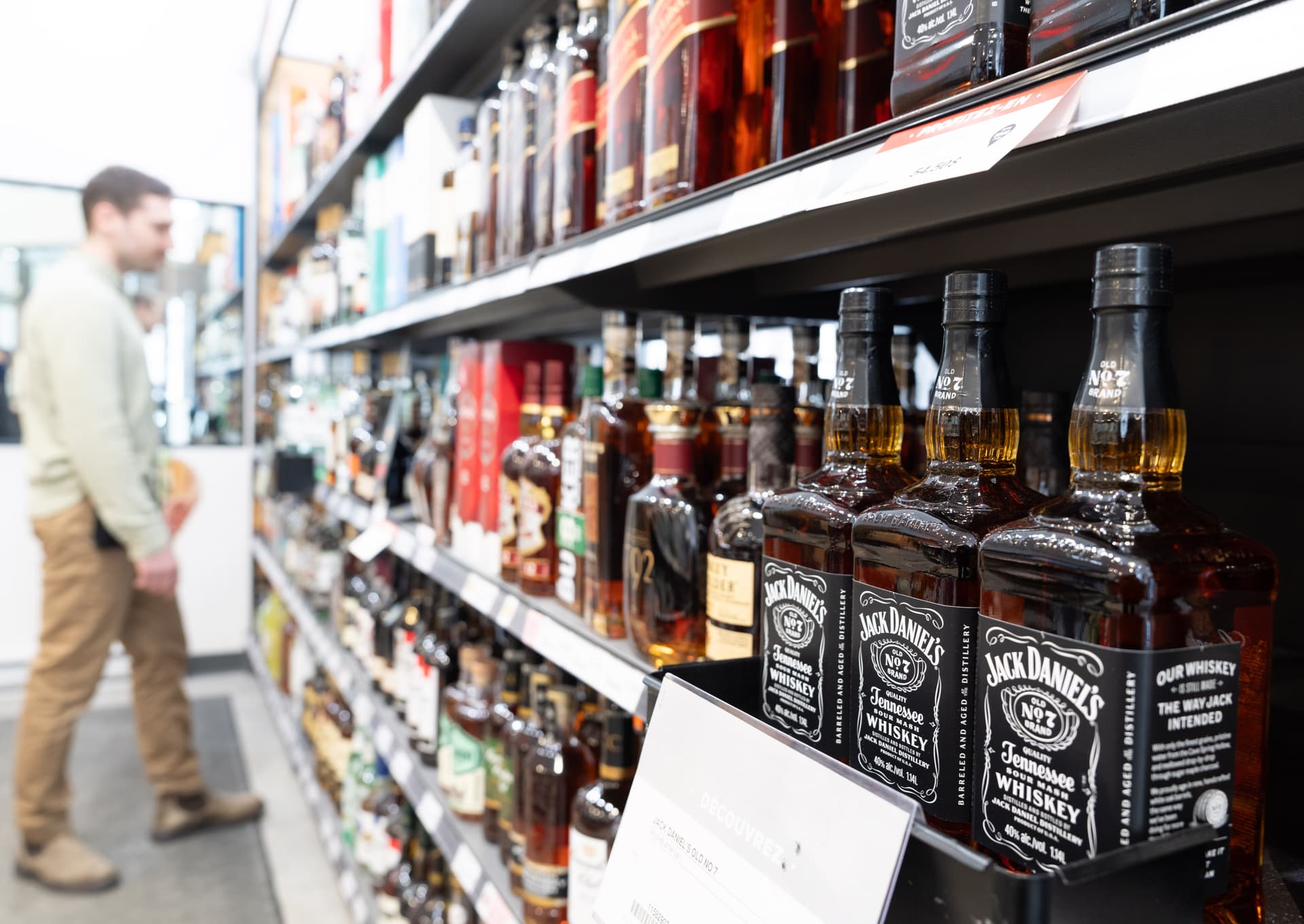 American whiskey is seen on the shelves of a SAQ liquor store in Montreal on March 4, 2025. (The Canadian Press/Christinne Muschi)