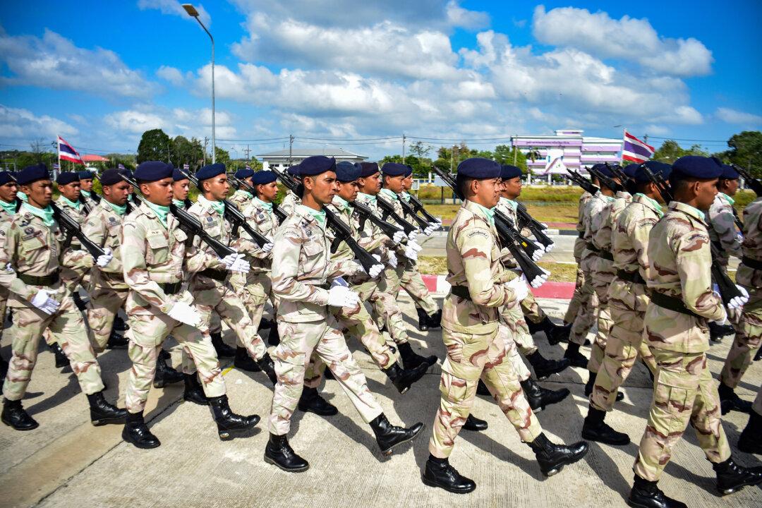 Thai civilian defense volunteers take part in a parade on the eve of the annual Defence Volunteers Day in Narathiwat, Thailand, on Feb. 9, 2026. (Madaree Tohlala/AFP via Getty Images)