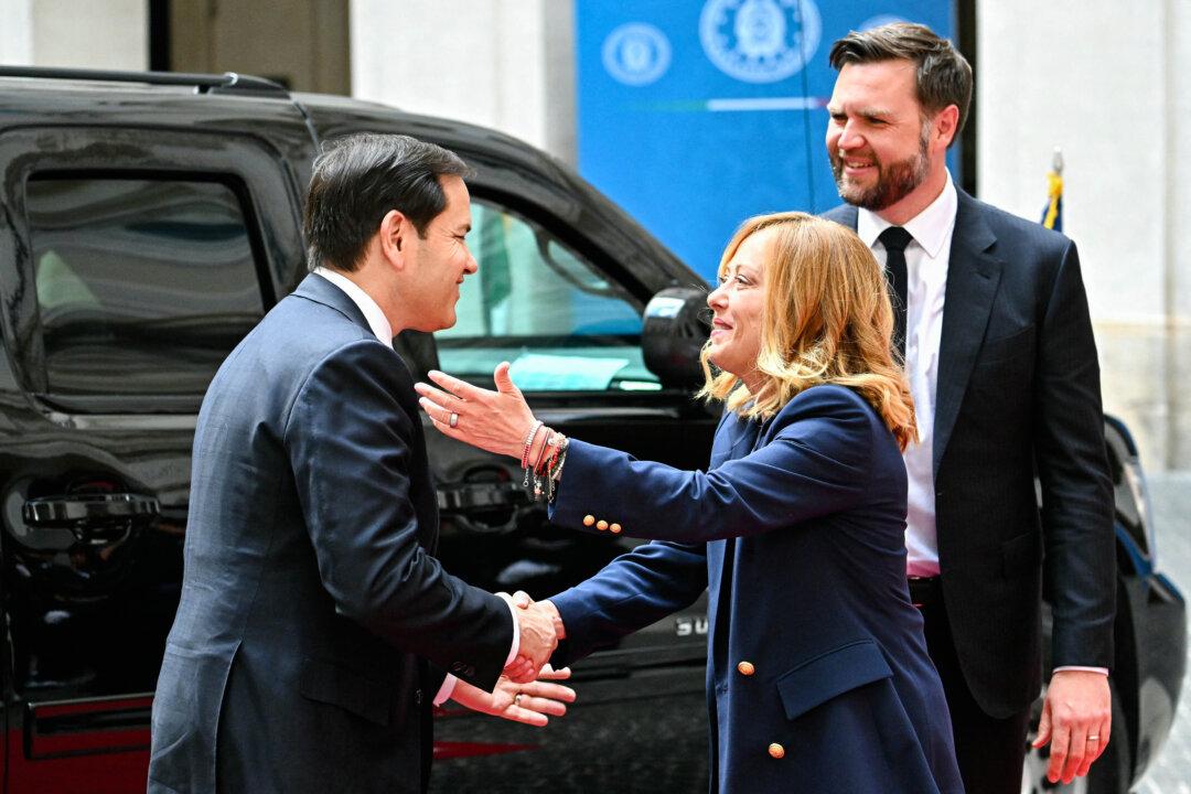 (Top Left) Secretary of State Marco Rubio (C), Germany's Political Director of the Ministry of Foreign Affairs Gunter Sautter (2nd Right), and officials from other countries take part in a meeting in Paris on April 17, 2025. (Top Right) Secretary of State Marco Rubio disembarks a plane at Norman Manley International Airport in Port Royal, Jamaica, on March 26, 2025. (Bottom Left) Italian Prime Minister Giorgia Meloni (C) welcomes Vice President JD Vance (R) and Secretary of State Marco Rubio at Palazzo Chigi in Rome on May 18, 2025. (Bottom Right) Secretary of State Marco Rubio speaks to a Senate staff member as he heads to a closed door meeting with lawmakers on Capitol Hill in Washington on Dec. 16, 2025. (Julien De Rosa/POOL/AFP via Getty Images, Nathan Howard/POOL/AFP via Getty Images, Alberto Pizzoli/AFP via Getty Images, Andrew Harnik/Getty Images)
