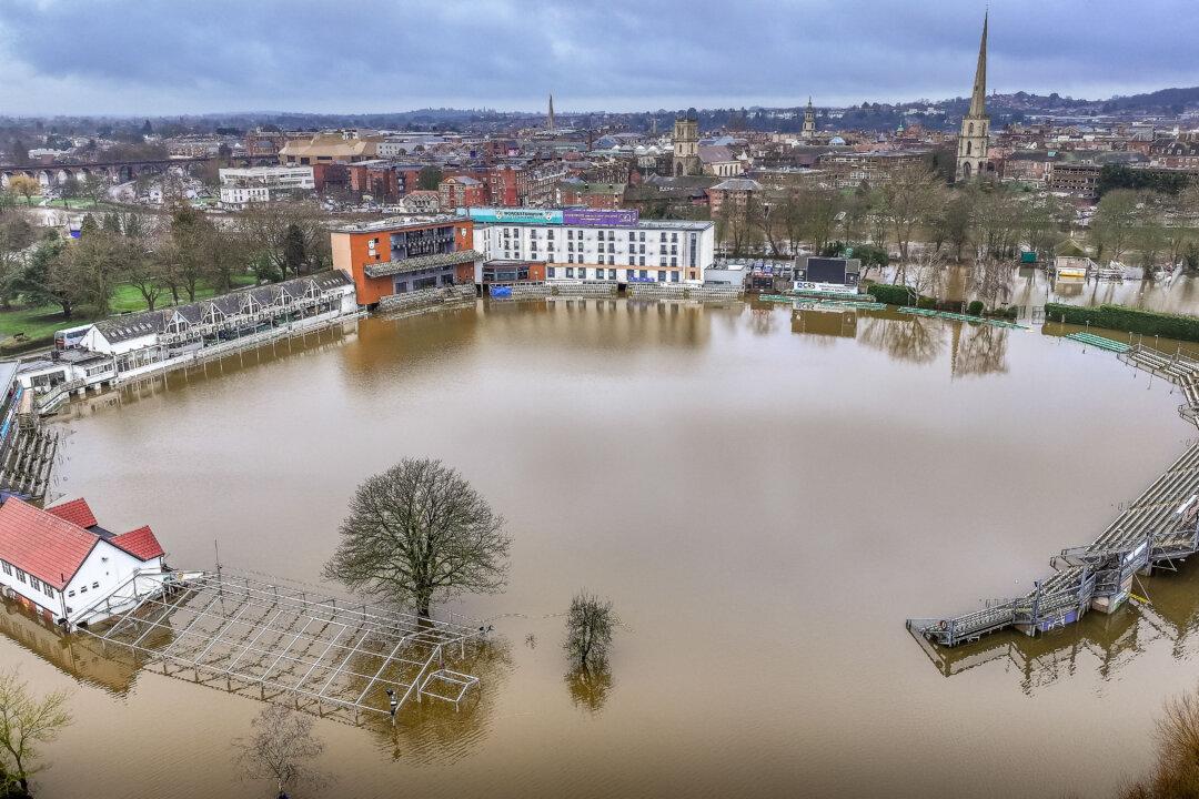 Flood water covers Worcestershire County Cricket Ground in Worcester, England, on Feb. 10, 2026. Heavy rainfall has caused flooding across Worcestershire and Herefordshire in recent days, and with already saturated ground, 94 flood warnings and 149 flood alerts have been issued by the Environment Agency in England. (Christopher Furlong/Getty Images)