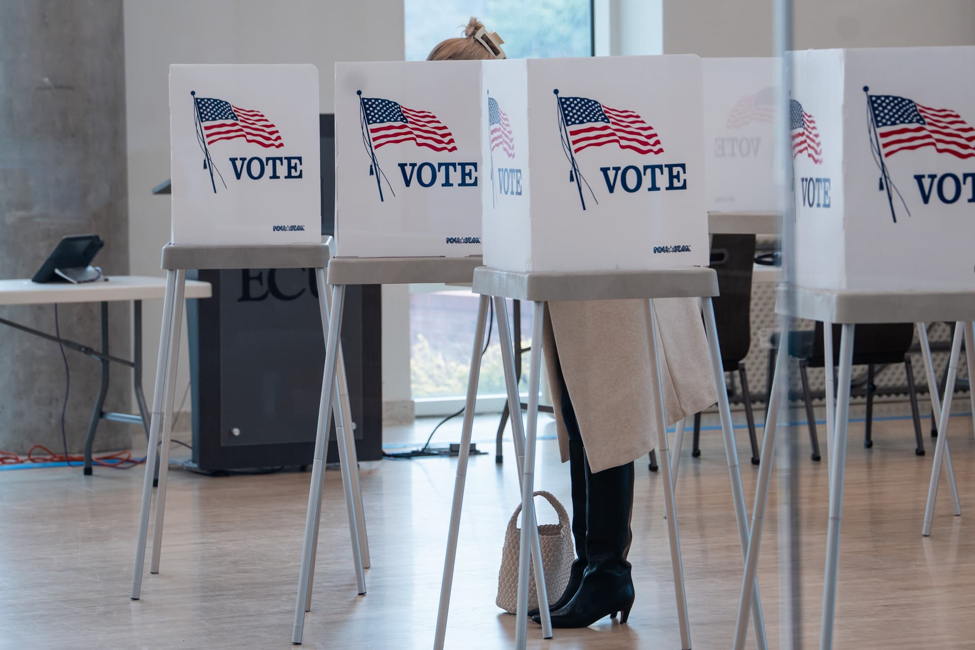 A woman votes at an early voting polling site at East Carolina University as North Carolina begins its midterm primary election, in Greenville, N.C., on Feb. 12, 2026. (Madalina Kilroy/The Epoch Times)
