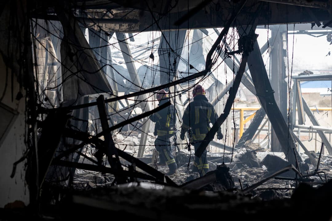 Ukraine's State Emergency Service rescuers walk through the rubble of a heavily damaged building at the site of a Russian attack in Odesa on Feb. 13, 2026. Six people died in Russian strikes across Ukraine overnight that targeted the southern port city and energy infrastructure, officials said. Moscow has stepped up its attacks on Ukraine's critical infrastructure in recent weeks despite pressure by the United States to reach a peace deal with Kyiv. (Oleksandr Gimanov/AFP via Getty Images)