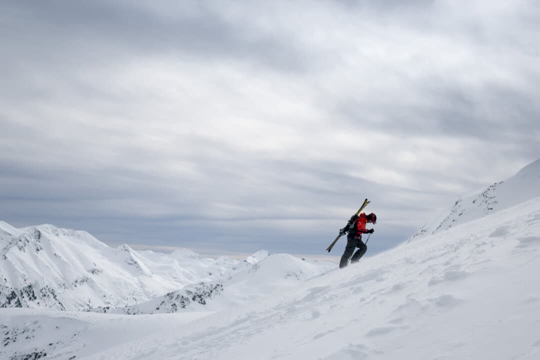 A skier climbs the slope to the Todorka peak in the Pirin Mountains in Bulgaria on Feb. 14, 2026. (Nikolay Doychinov/AFP via Getty Images)
