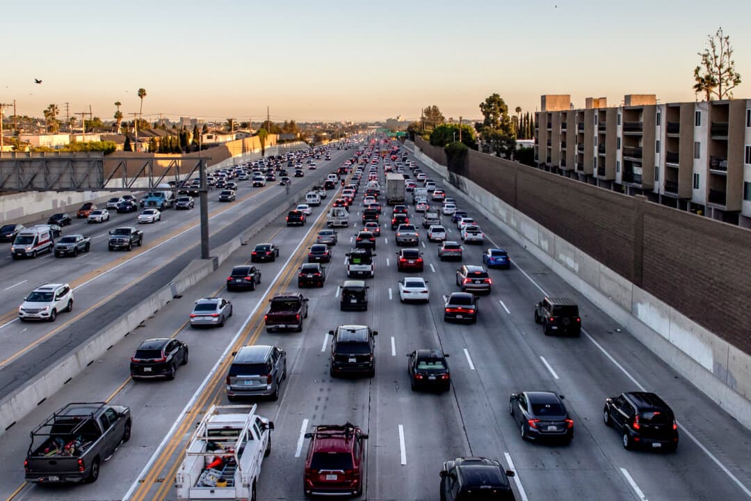 Traffic moves along the 405 Freeway in Los Angeles on Feb. 13, 2026. On Feb. 12, the U.S. EPA officially repealed the 2009 “endangerment finding,” removing the legal basis for the federal regulation of greenhouse gases from vehicles. (Apu Gomes/Getty Images)