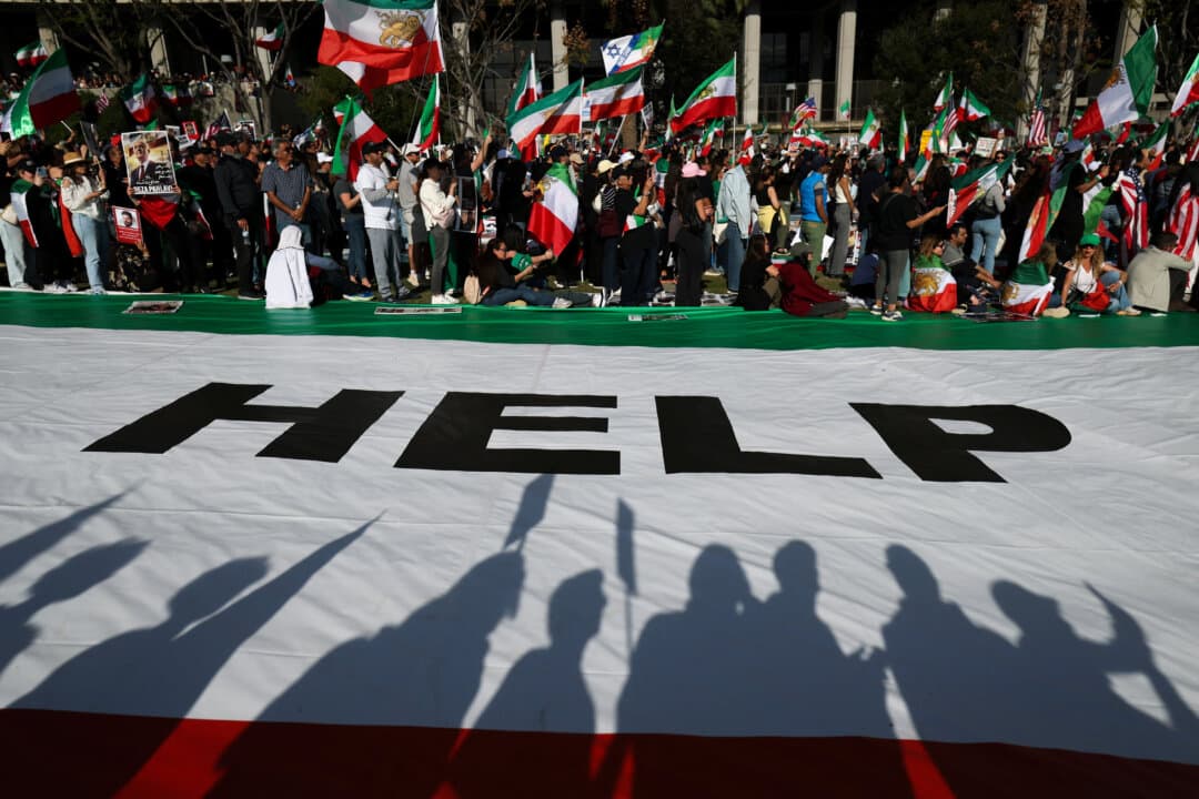 Demonstrators take part in a march in support of the people of Iran by members of the American-Iranian community in Los Angeles on Feb. 14, 2026. The demonstration comes after a bloody clampdown on protesters last month. (Patrick T. Fallon/AFP via Getty Images)