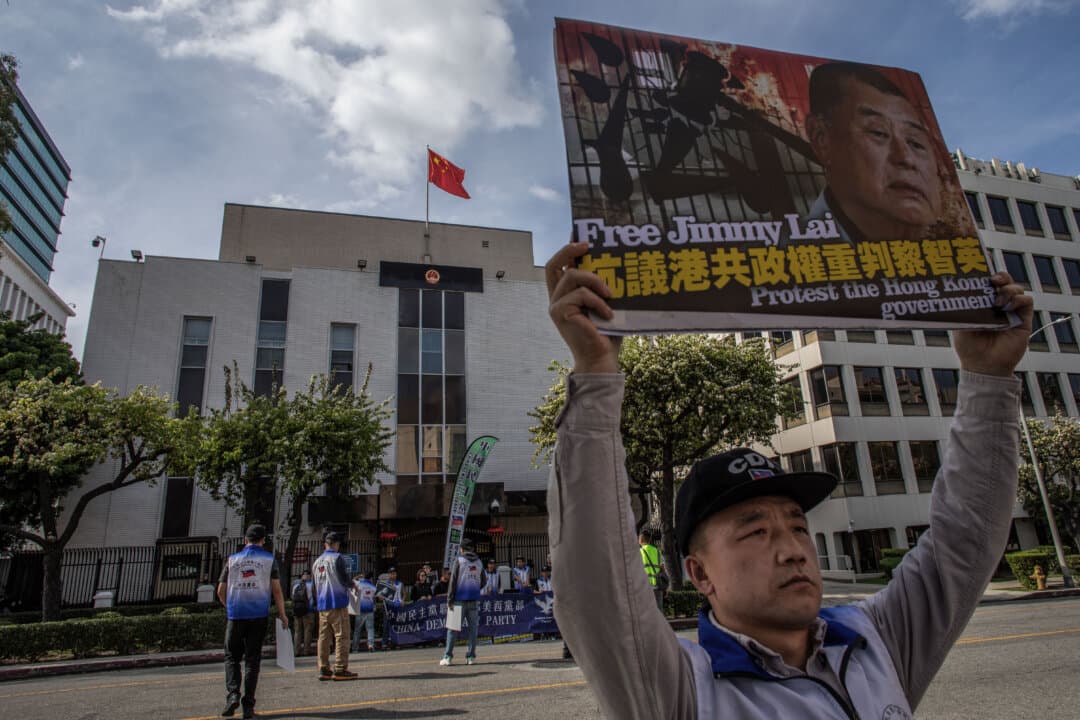People gather in front of the Chinese Consulate General to protest the unjust conviction of media entrepreneur Jimmy Lai in Los Angeles on Feb. 14, 2026. Lai is a Hong Kong media entrepreneur who has stood up for the freedom of the Press. He has been held since Dec. 2, 2020 and was convicted for violating Beijing’s imposed National Security Law on Hong Kong, which was passed in 2020. The prosecution retroactively prosecuted him on activities conducted prior to June 30, 2020. (Apu Gomes/Getty Images)