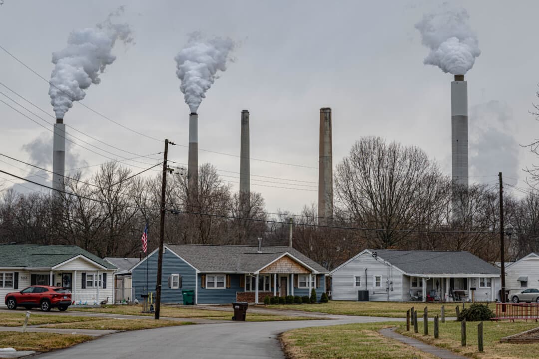 The flue-gas stacks of Mill Creek Generating Station are seen from the Valley Village neighborhood in Louisville, Ky., on Feb. 14, 2026. President Donald Trump and Environmental Protection Agency (EPA) Administrator Lee Zeldin revoked the EPA’s 2009 “endangerment finding,” which concluded that carbon dioxide and other greenhouse gases endanger human health and the environment and underpin federal efforts to regulate emissions. (Jon Cherry/Getty Images)