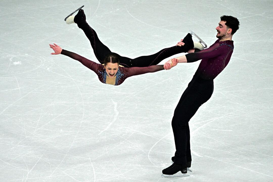Germany's Annika Hocke and Robert Kunkel compete in the figure skating pairs' free skating final during the Milano Cortina 2026 Winter Olympic Games in Milan on Feb. 16, 2026. (Julien De Rosa/AFP via Getty Images)